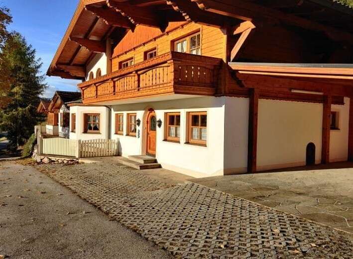 Discover the charm of this stunning property, showcasing exquisite wooden architecture and a warm, inviting ambiance.