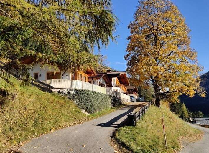 Discover charming mountain homes nestled amidst the beauty of nature.