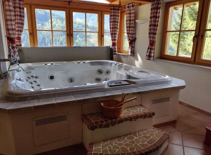 Relax and unwind in this luxurious jacuzzi, perfect for a rejuvenating escape.