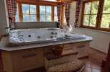 Relax and unwind in this luxurious jacuzzi, perfect for a rejuvenating escape.