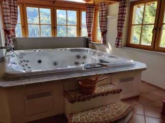 Relax and unwind in this luxurious jacuzzi, perfect for a rejuvenating escape.