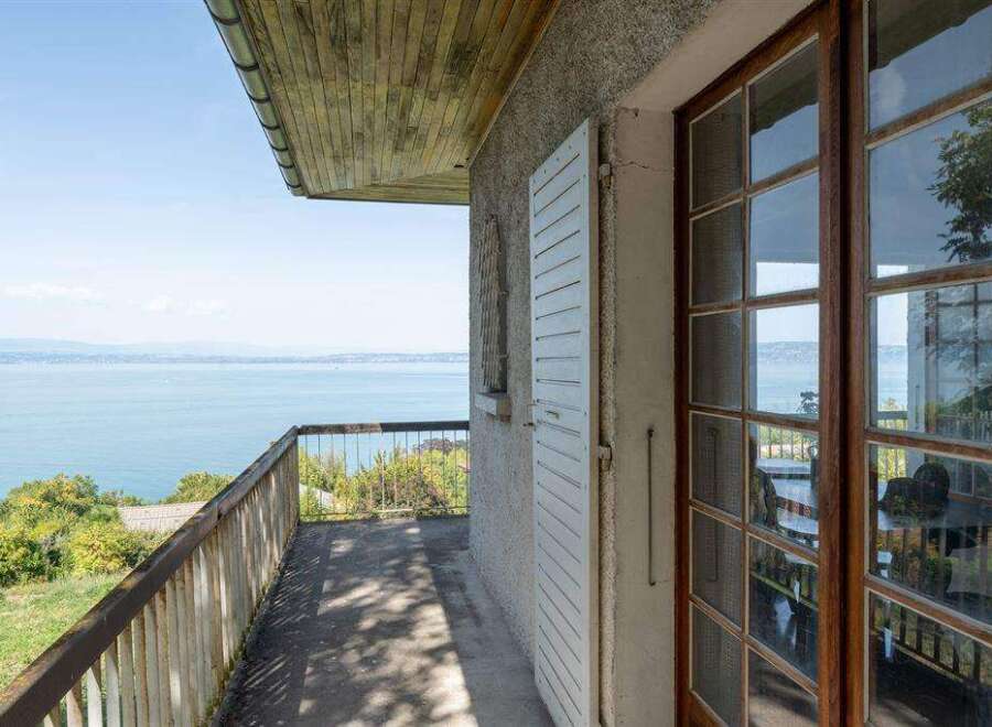 This stunning property boasts breathtaking lake views from its private balcony.