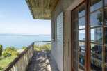 This stunning property boasts breathtaking lake views from its private balcony.