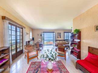 Lakefront living room with stunning views.