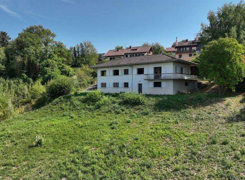 Nestled on a spacious lot, this charming house offers serene views and ample outdoor space.