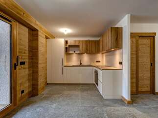 This stunning kitchen boasts a modern design with a touch of rustic charm.
