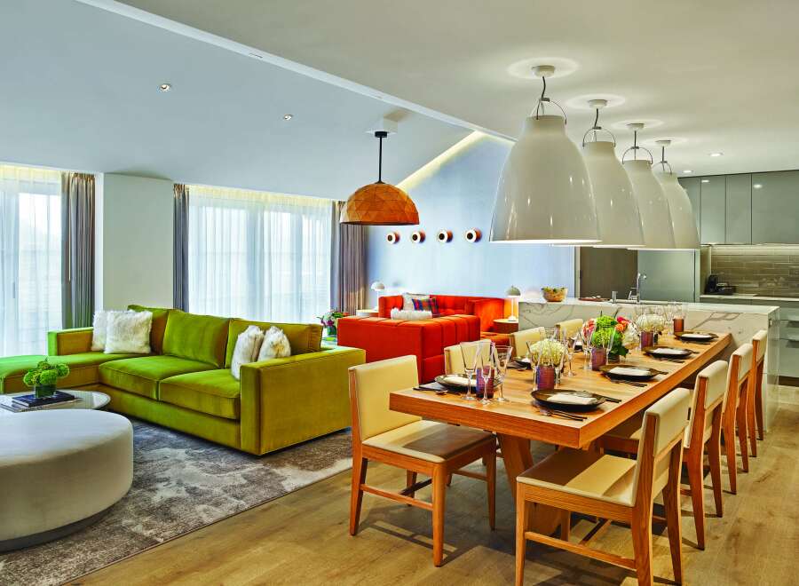 This luxurious apartment boasts an open-concept living and dining area, perfect for entertaining.