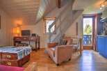Cozy chalet apartment with stunning mountain views.