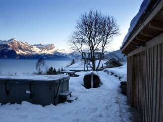 Luxury chalet with stunning mountain views and a private hot tub.