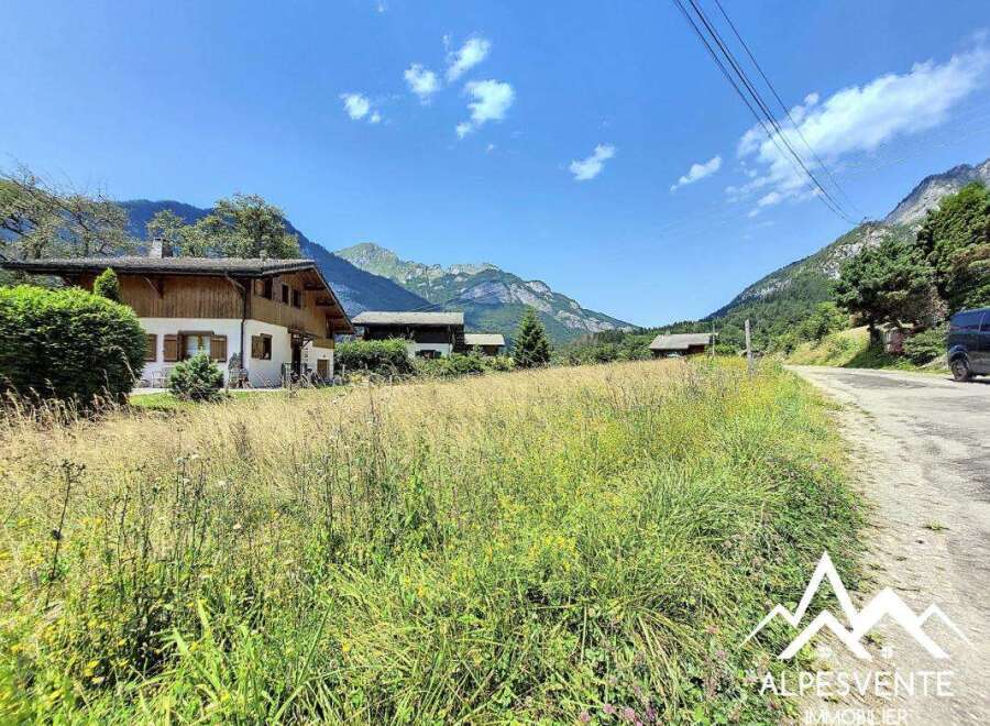 Mountain view property with large grassy area.