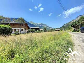 Mountain view property with large grassy area.