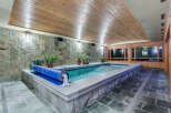 This luxurious indoor pool is perfect for a relaxing swim any time of year.