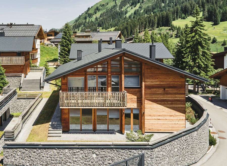 This stunning chalet boasts a prime location in the Austrian Alps, offering breathtaking mountain views.
