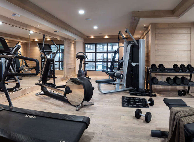 This luxurious chalet boasts a state-of-the-art fitness center, complete with top-of-the-line equipment such as treadmills, ellipticals, and weight machines.