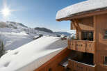 Experience the ultimate winter getaway in this stunning chalet, nestled in a picturesque mountain setting.