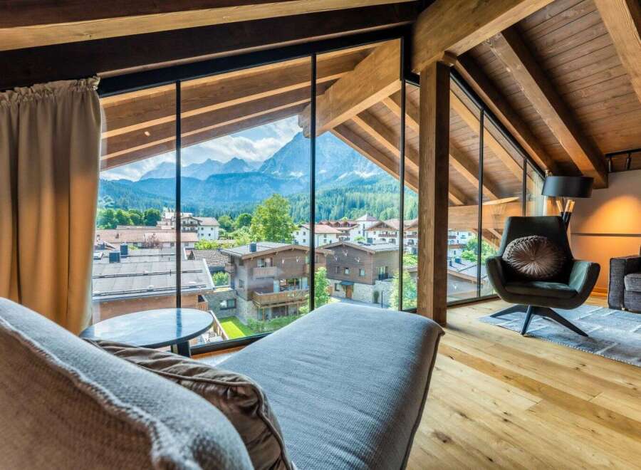 Wake up to breathtaking mountain views from this luxurious chalet.
