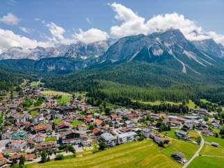 Nestled in a picturesque valley, this stunning property offers breathtaking views of the majestic Alps.