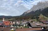 Nestled in a charming village, this property offers breathtaking views of majestic mountains and lush greenery.
