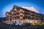 Nestled in the Dolomites, this stunning hotel boasts a unique blend of modern luxury and traditional alpine architecture.