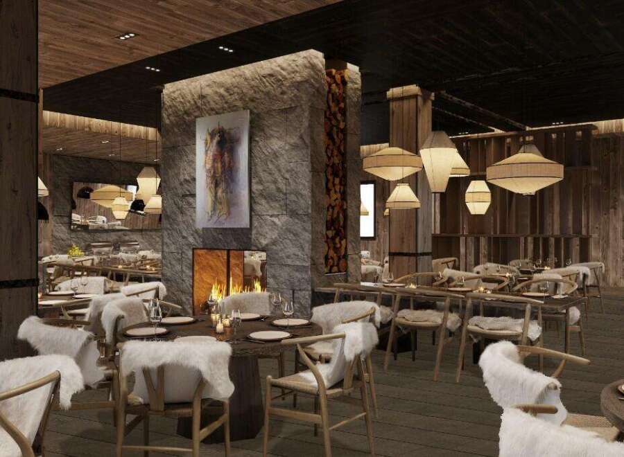 This stunning restaurant boasts a rustic-chic design with a cozy fireplace as its centerpiece.