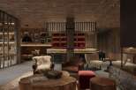 This luxurious lodge boasts a stunning lobby with a rustic-chic design, featuring a large stone fireplace, comfortable leather armchairs, and a unique wooden coffee table.