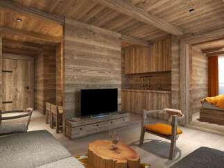 This stunning wooden chalet boasts a spacious open-plan living area with a cozy seating arrangement and a large flat-screen TV.