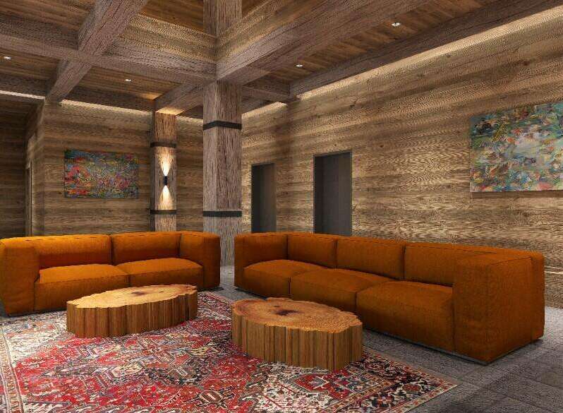 This stunning property boasts a spacious living area with plush orange sofas, perfect for relaxation.