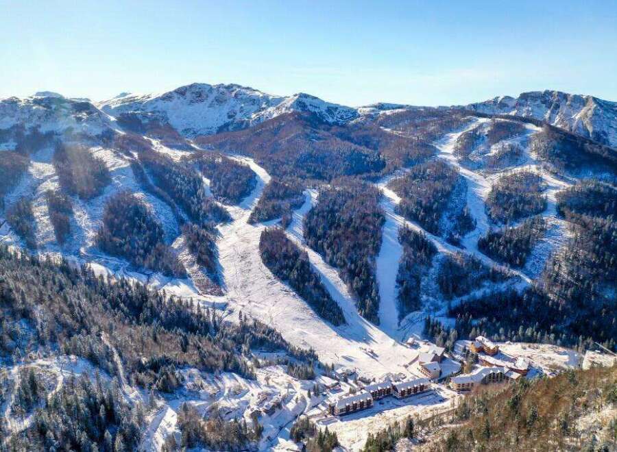 Nestled in a stunning snow-capped mountain range, this resort offers breathtaking views and easy access to various ski slopes.