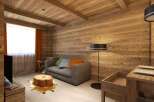 Cozy wooden cabin living room with a grey sofa, tree stump coffee table, and floor lamp.