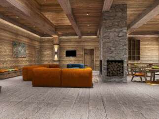 This stunning chalet boasts a spacious open-plan living area with a cozy fireplace, perfect for relaxing after a day on the slopes.