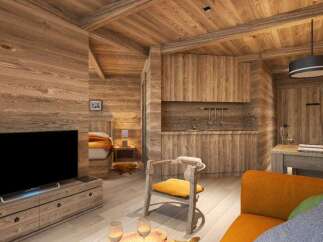 This stunning wooden chalet boasts a cozy living area with a comfortable sofa, a rustic wooden chair, and a modern flat-screen TV.