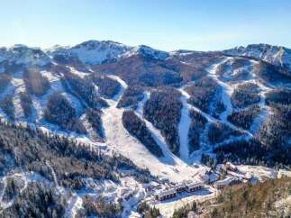 Nestled in a stunning snow-capped mountain range, this resort offers breathtaking views and easy access to various ski slopes.