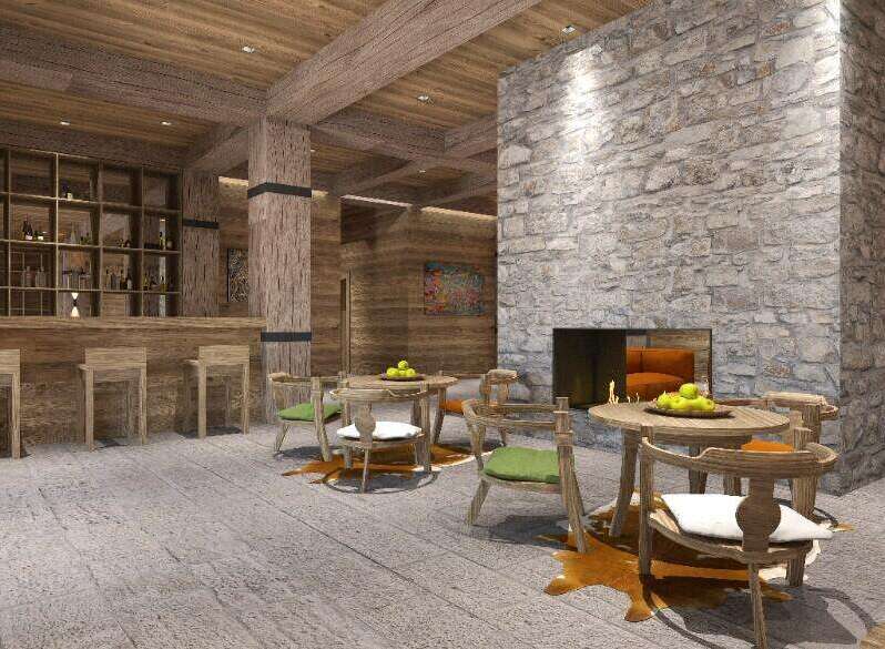 This stunning lodge boasts a rustic-chic design, featuring a cozy stone fireplace as the centerpiece of the main living area.