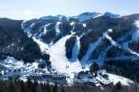 Nestled in a stunning snow-covered mountain range, this resort offers breathtaking views and easy access to various ski slopes.