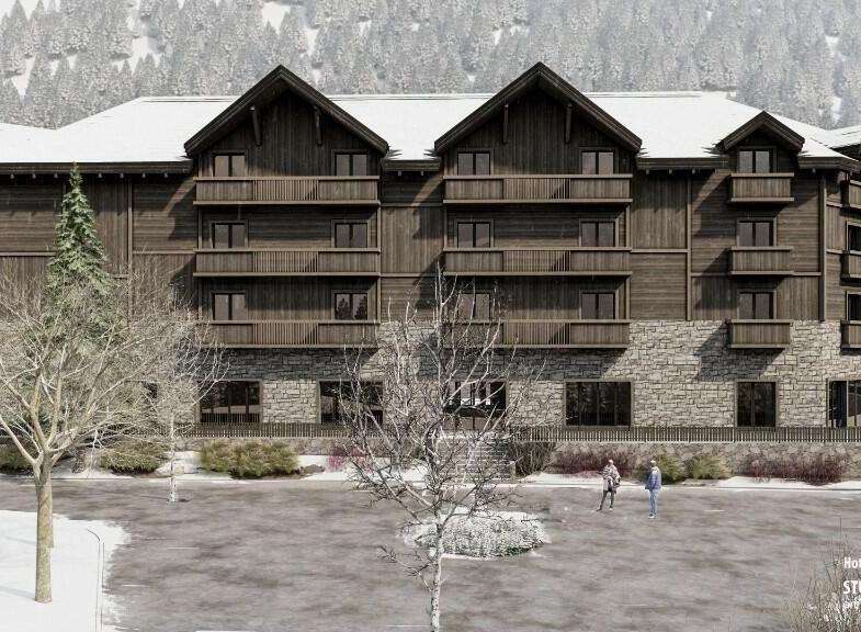 This stunning hotel boasts a rustic-chic design, featuring a charming wooden facade and stone accents.
