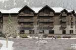 This stunning hotel boasts a rustic-chic design, featuring a charming wooden facade and stone accents.