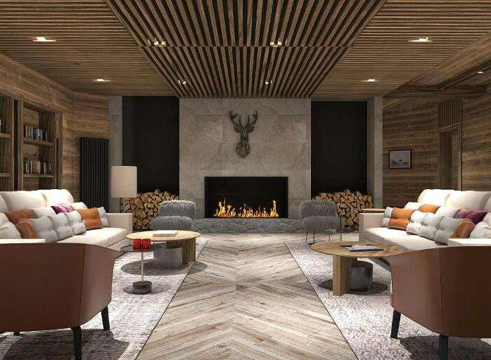 This stunning hotel lobby boasts a cozy and elegant atmosphere, featuring a beautiful fireplace as the centerpiece.