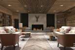 This stunning hotel lobby boasts a cozy and elegant atmosphere, featuring a beautiful fireplace as the centerpiece.