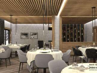 This stunning restaurant boasts a modern design with a rustic touch, featuring a wood slat ceiling and concrete walls.