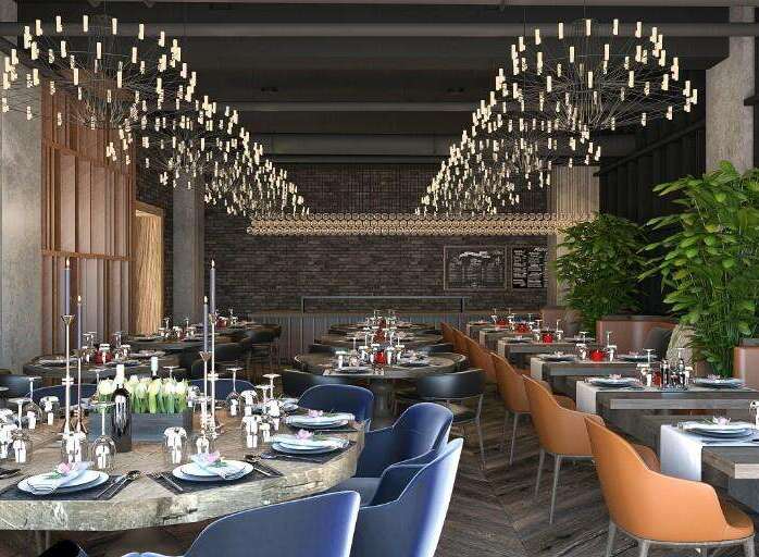 Hotel B in Kolasin boasts a sophisticated restaurant with unique lighting fixtures and wooden accents.