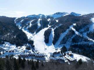 Nestled in a stunning snow-covered mountain range, this resort offers breathtaking views and easy access to various ski slopes.