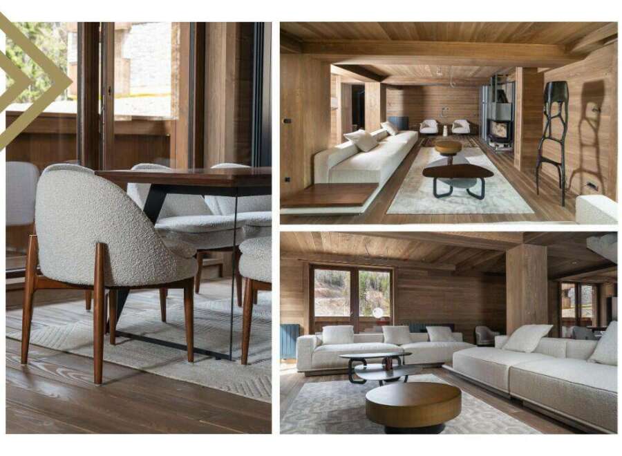 This stunning chalet boasts a spacious open-plan living area with floor-to-ceiling windows offering breathtaking views, complemented by a cozy fireplace and luxurious furnishings.