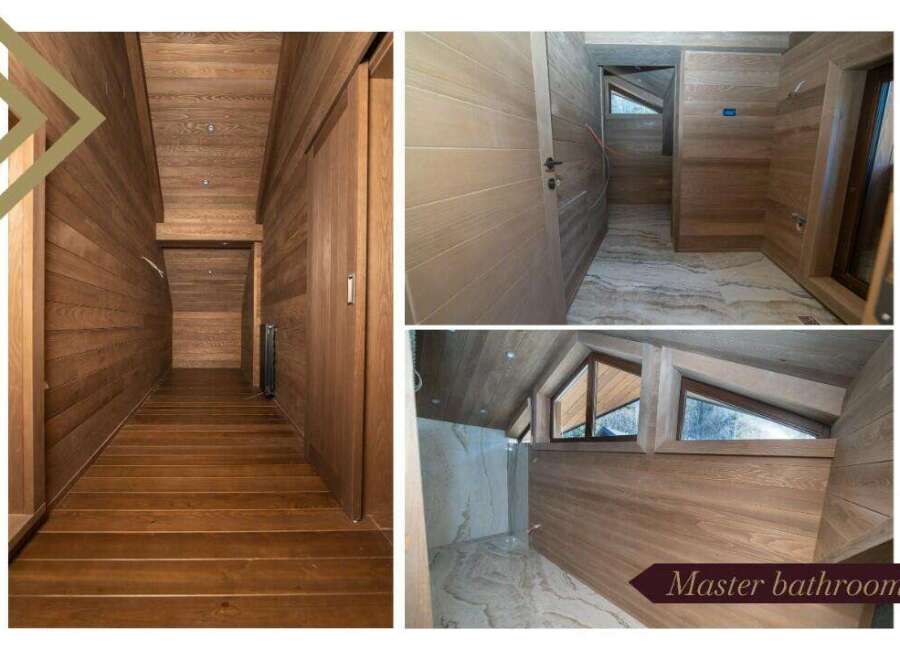 This luxurious master bathroom boasts stunning wood paneling, creating a warm and inviting atmosphere.