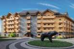 This stunning hotel boasts a unique architectural design, blending natural stone and wood for a cozy yet modern aesthetic.