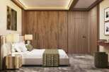Luxury bedroom with a king-size bed, wooden closet, and nightstands.