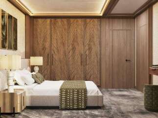 Luxury bedroom with a king-size bed, wooden closet, and nightstands.