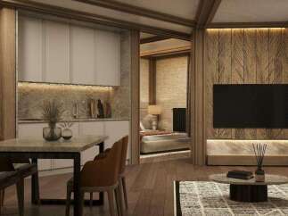 This stunning apartment boasts a modern kitchen with sleek cabinetry and granite countertops, seamlessly flowing into a cozy living area with a large flat-screen TV and stylish wooden wall accents.