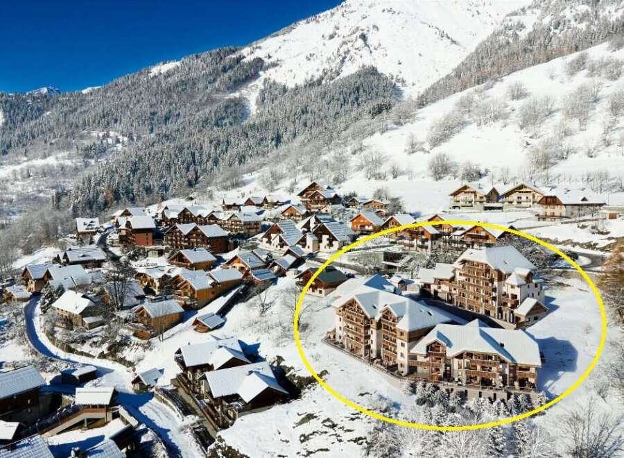Nestled in a charming snow-covered village, this stunning ski resort offers breathtaking mountain views.