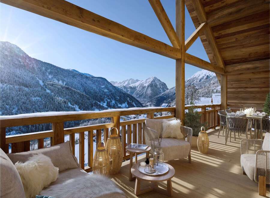 This stunning chalet boasts a spacious balcony with breathtaking mountain views, perfect for enjoying a morning coffee or evening apéritif.
