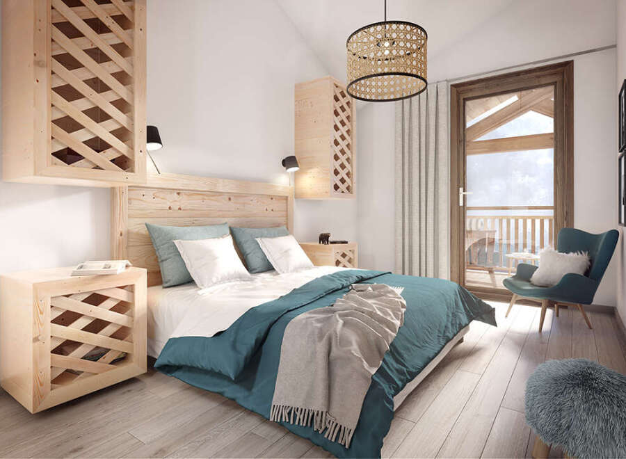 This stunning bedroom boasts a serene atmosphere with its light wood accents and teal bedding.